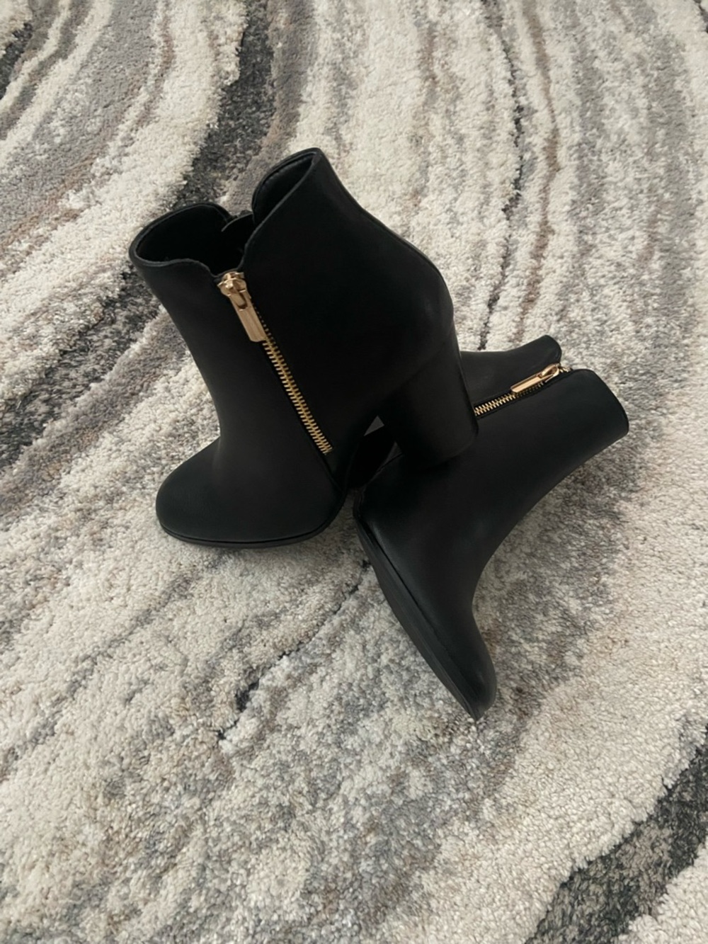 Classic Black Ankle Booties with Gold Zip Accent